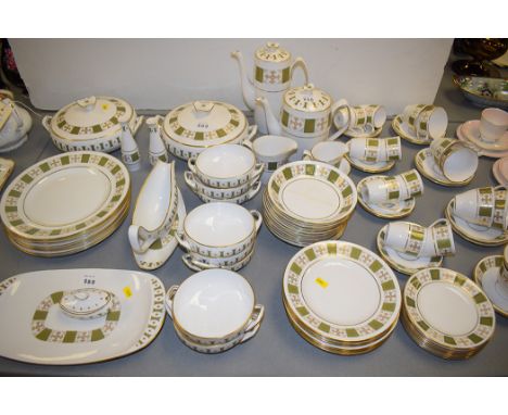 A Spode 'Persia' part dinner, coffee and tea service, no. Y8018, with green and gilt decoration.