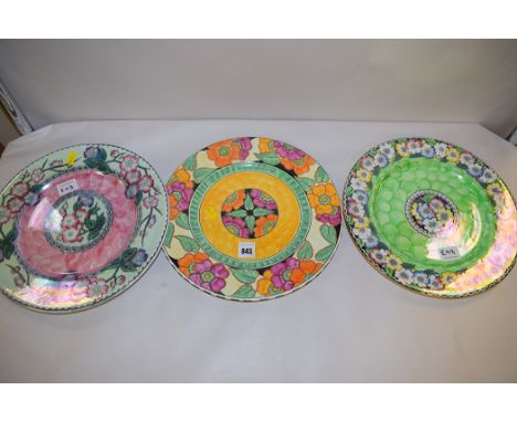 Maling: a 'Gloria Painted Orange' plate, 1933/34, pattern no. 6134; a 'Garland Black Print Green' lustre glaze plate, 1940's,