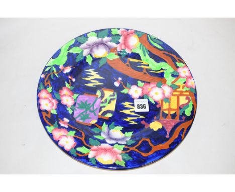 A Maling 'Japanese Lantern' plate, on cobalt blue ground, pattern no. 6067, 28.5cms.