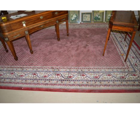 A machine-made Persian style carpet by Steffensmeier, 399 x 301cms.