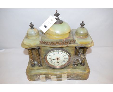A late 19th/early 20th Century mantel clock, enamel roman dial in onyx and brass mounted case.
