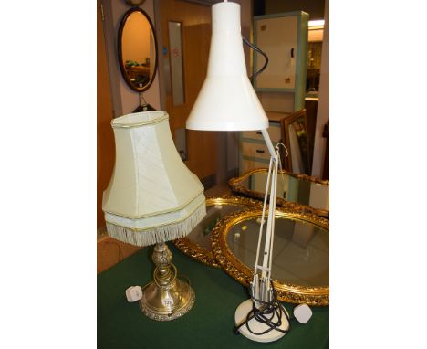 A modern cream painted anglepoise lamp, with circular weighted base; together with another metal table lamp with green shade.
