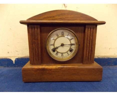 EDWARDIAN OAK ARCHED CASED MANTEL CLOCK