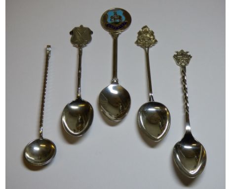 830 WHITE METAL RIBBED TEASPOON, THREE HM SILVER NOVELTY TEASPOONS WITH CRESTED FINIALS AND A COVENTRY INTEREST ENAMEL TOPPED