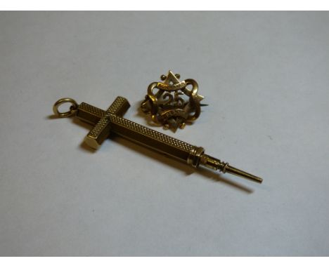 9CT GOLD BOW MAKER 25 LAPEL BADGE 3.3G APPROX, AN UNMARKED NOVELTY CROSS PROPELLING PENCIL 