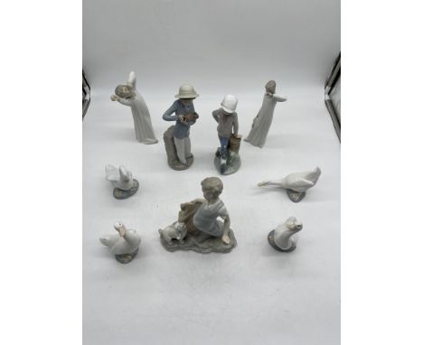 Collection of seven NAO figurines and two other. 
Good condition, no damage. 