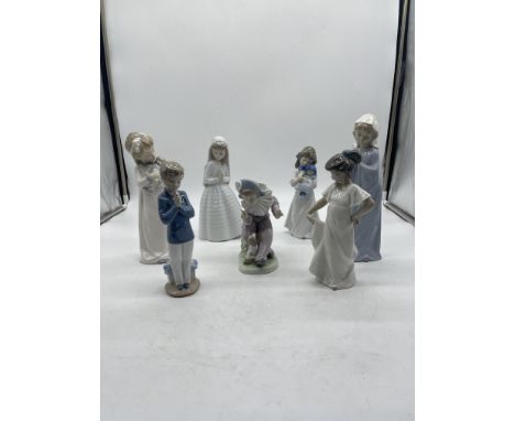 Collection of Seven NAO Figurines. 
Good condition, no damage. 