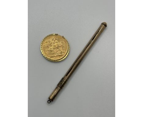 1906 Full Sovereign and Rolled Gold Swizzle Stick. 