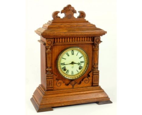 A NORTH AMERICAN WALNUT MANTLE CLOCK BY THE ANSONIA CLOCK CO, LATE 19TH CENTURY