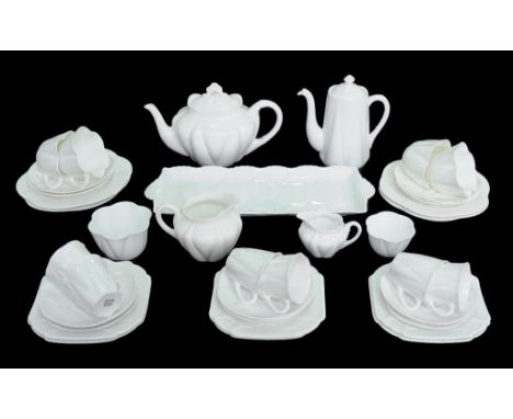 A SHELLEY GLAZED PORCELAIN TEA AND COFFEE SERVICE AND AN OBLONG TRAY