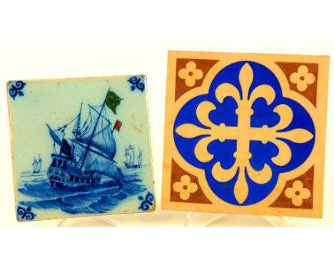 A DUTCH DELFTWARE TILE PAINTED WITH A SHIP AND A VICTORIAN GOTHIC ENCAUSTIC TILE