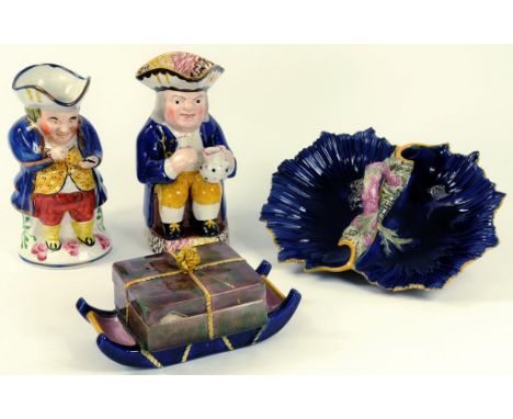 A COPELAND MAJOLICA BUTTER DISH AND COVER IN THE FORM OF A BOX ON A SLED, IMPRESSED MARK, CIRCA 1880, A GEORGE JONES MAJOLICA