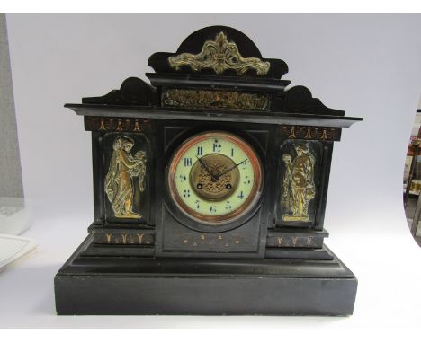 A late Victorian slate mantel clock of architectural form, Arabic enamelled dial, French drum 8 day movement with pendulum, 3