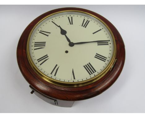An early 20th Century oak school/station clock with a 12'' Roman dial, 8 day movement with going barrel, key and pendulum