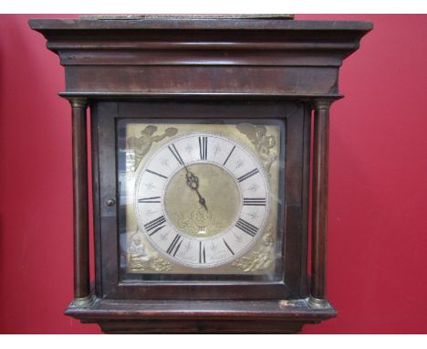 A late 18th Century mahogany longcase clock, the 11'' square brass dial with silvered Roman chapter ring and ormolu figural c