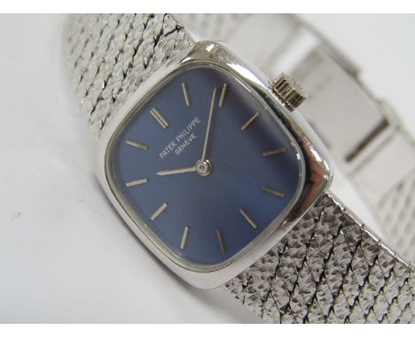 PATEK PHILIPPE: an ''Ellipse'' lady's 18ct white gold manual wind bracelet watch with metallic blue dial, ref. 4179-1, white 