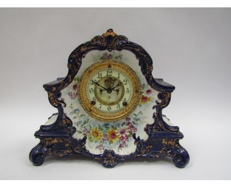 A late 19th Century ceramic mantel clock with Ansonia striking movement, Arabic enamelled dial a/f, visible Brocot escapement