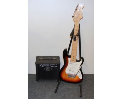 An Elevation electric guitar stand and amplifier
