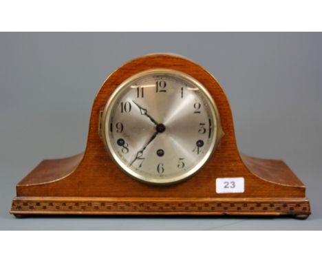A chiming oak mantle clock, 40 x 23cm.