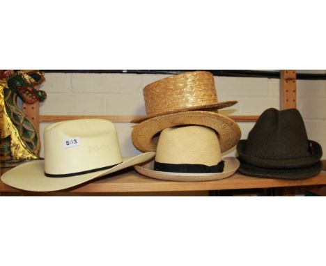 A group of vintage gentlemen's hats.