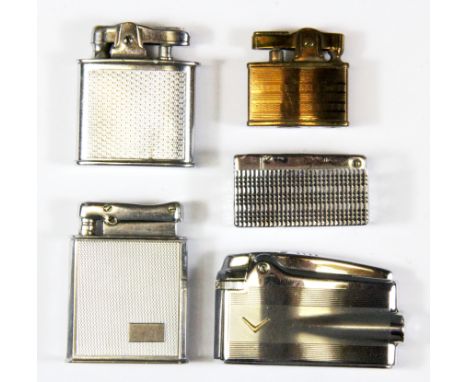 Five vintage cigarette lighters.