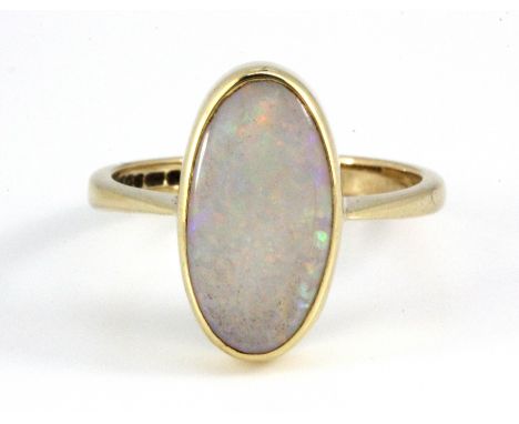 A 9ct yellow gold opal set ring, (L).