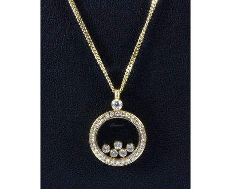 A matching Chopard 18ct yellow gold diamond set pendant and chain, L. 2cm.