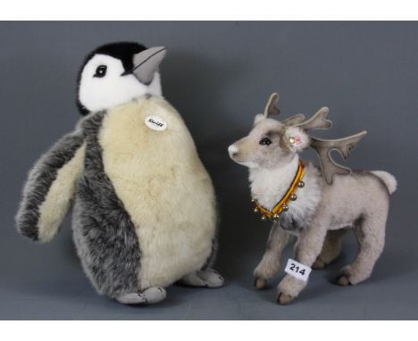A Steiff penguin, H. 37cm, together with a Steiff reindeer.