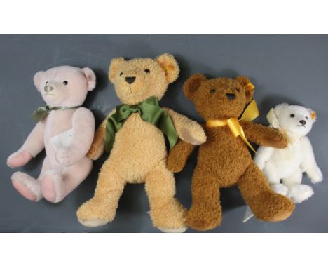 Four Steiff teddy bears.