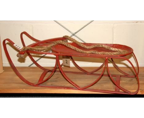 A vintage child's sledge, L. 60cm.