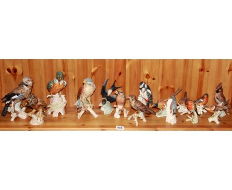 A quantity of Hummel bird figures.