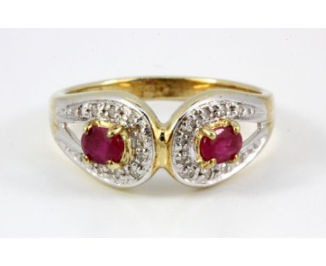 A 9ct yellow gold ruby and diamond set ring, (M.5).