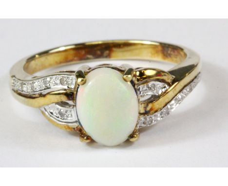 A 9ct yellow gold opal and diamond set ring, (M.5)