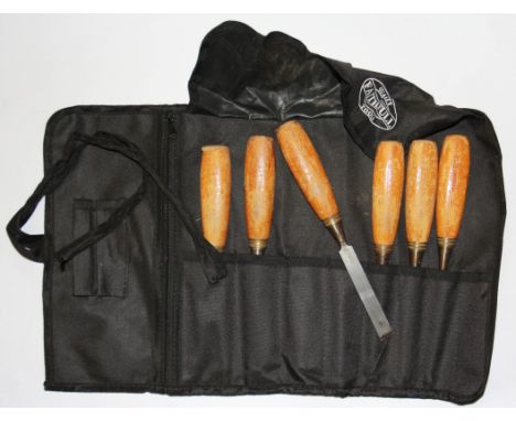Six cased footprint vintage woodworking chisels.