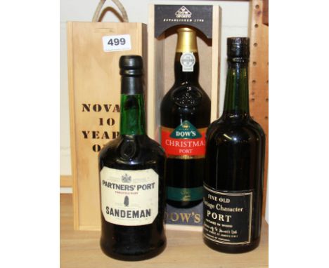 Four bottles of vintage port.
