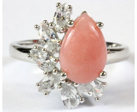 A 925 silver cabochon cut pink opal and white stone set ring, (R.5).