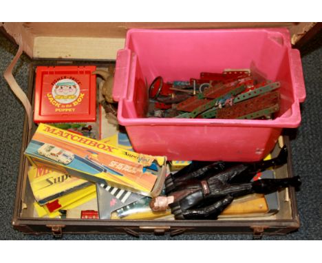 A vintage case of Meccano and other toys.