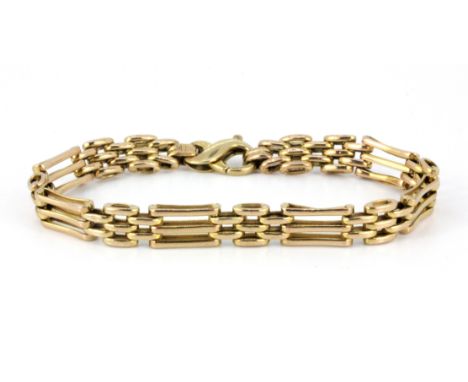 A 9ct yellow gold triple gate bracelet, approx. 10.3g.
