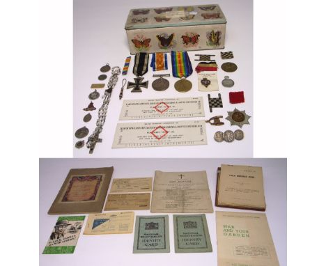 Two WWI medals awarded to "Private J. Dutton" the "14-18" medal and "The Great War Medal" both inscribed "77355 Pte. J. Dutto