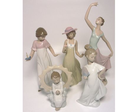 Five Nao figurines; a young boy praying, a young girl with a fan, a young girl with a candle (af) and two figurines of ladies