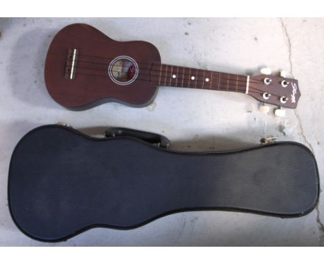 A Stagg ukulele, model no US10 in hard carry case.