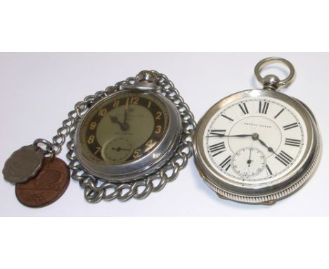 A white metal open face pocket watch, white enamel dial set with Roman numerals inscribed to inside cover "Fine Silver" and s