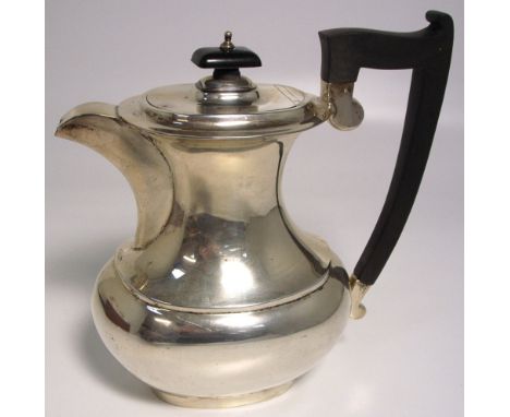 A George V hallmarked silver coffee / hot water, Sheffield 1935, approx 21.1ozt.