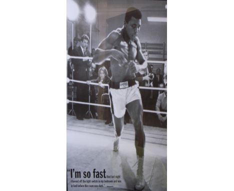 A black and white photographic poster of Mohammed Ali sparring in  a practice ring "I'm so fast that last night I turned off 