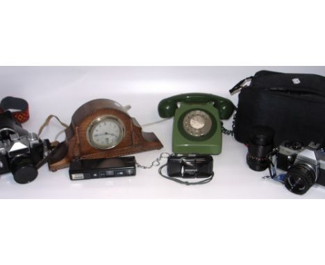 A cased Praktica TL5B camera body with Karl Zeiss Jena M42 screw thread mount, a Zenit-E 1980 Olympic Edition camera with M42
