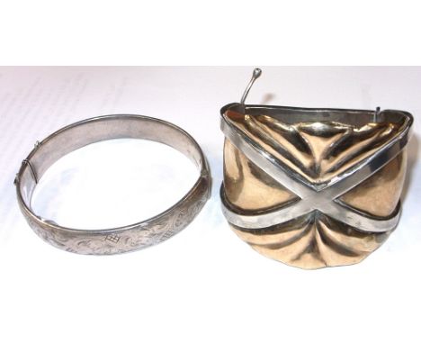 A George VI hallmarked silver bangle with yellow metal overlay, Chester 1951 and an Elizabeth II hallmarked silver bangle, Lo