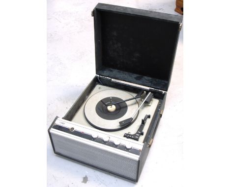 A mid 20th century ITTKB portable record player. CONDITION REPORT Would benefit from a little tlc but in good working order.