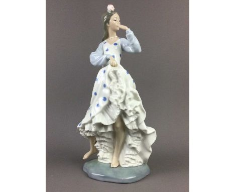 NAO FIGURE OF A FLAMENCO DANCER,38cm tall, along with a pair of Continental glass bird ornaments and a pair of ceramic horses