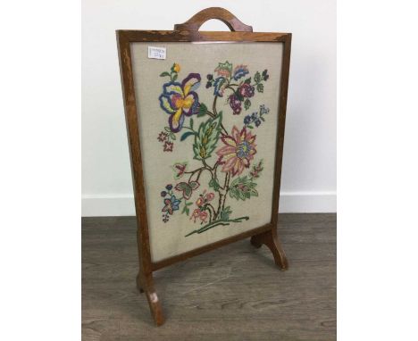 20TH CENTURY MAHOGANY FIRESCREEN,inset with a tapestry panel with floral and bird decoration, along with a rectangular wall m