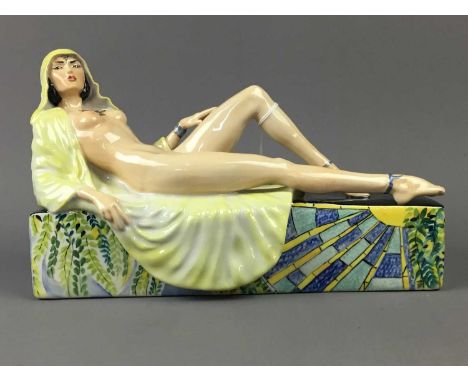 PEGGY DAVIS CERAMICS EROTIC SCULPTURE OF 'THE TEMPTRESS',by Victoria Bourne, with pale yellow cloak, the base painted with st